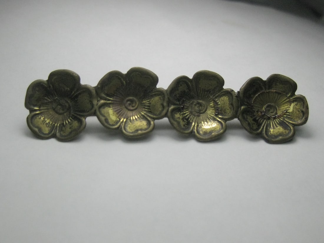 Vintage Victorian Brass Floral Bar Brooch, C-Clasp: Vintage Victorian Brass Floral Bar Brooch, C-Clasp. late 1800's to 1910. Some wear but still great for it's age. It is 2.75" wide and 5/8" tall with four blossoms. See photos for visual description. (