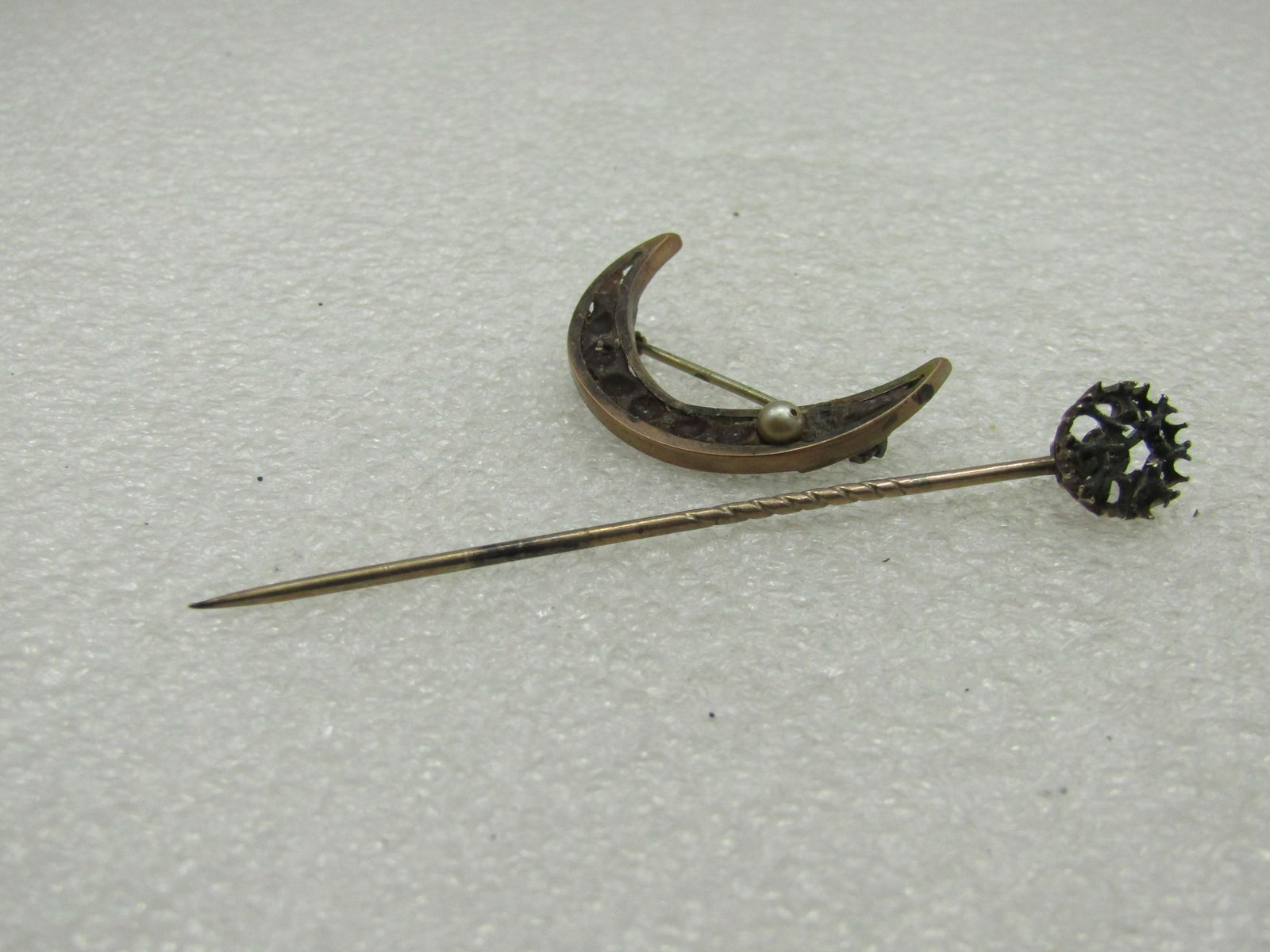 Victorian Stick Pin & Crescent Pins, Repurpose: Victorian Stick Pin & Crescent Pins, Repurpose. The crescent pin tests as 10kt G.F. With a little TLD and either rhinestones or pearls filling the empty slots, this could be a nice brooch. The pinback