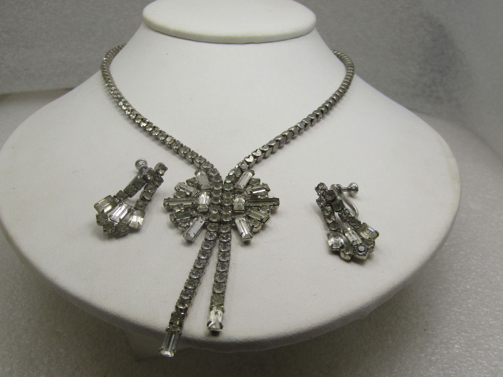 Vintage Rhinestone Drop Necklace & Earrings, 1940's: Vintage Rhinestone Drop Necklace & Earrings, 1940's. The necklace is 15.5" with a flip clasp. It has a single strandof appx. 3mm round clear stones set in a square setting with prongs on the corners.