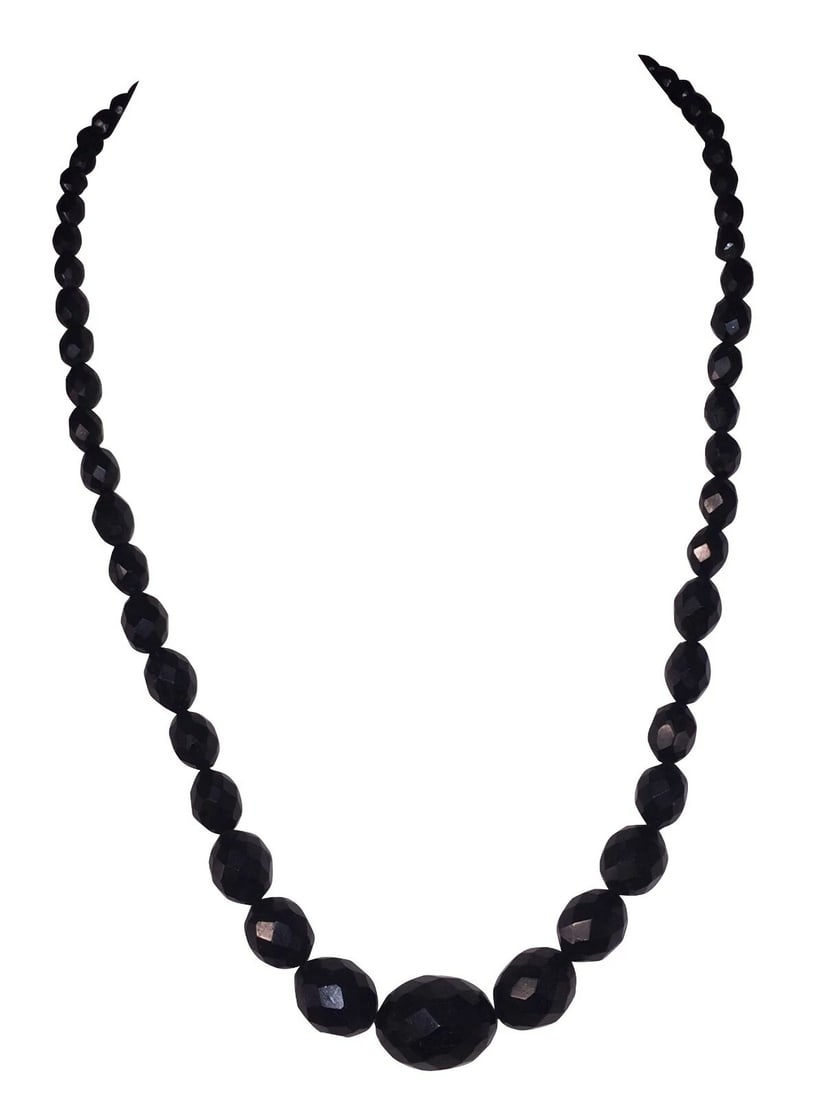 Victorian Graduated Faceted Jet Bead Necklace: Title:Victorian Graduated Faceted Jet Bead Necklace Description:Victorian graduated faceted jet bead necklace. Circa 1880s. Measures 23 1/2" long and 3/4" wide at it's largest point. Closes with invis
