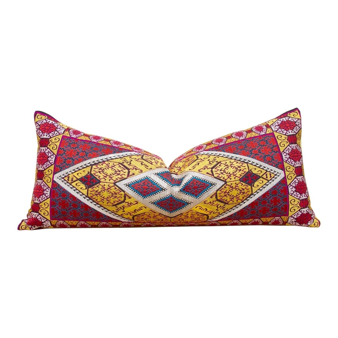 Colorful Swati Embroidered Phulkari Pillow Cover: This Swati tribal pillow was created using intricately embroidered fabric from Swat Valley, where "phulkari" embroidery was its classic symbol. With bold silken hues and elaborately scrolled motifs, t