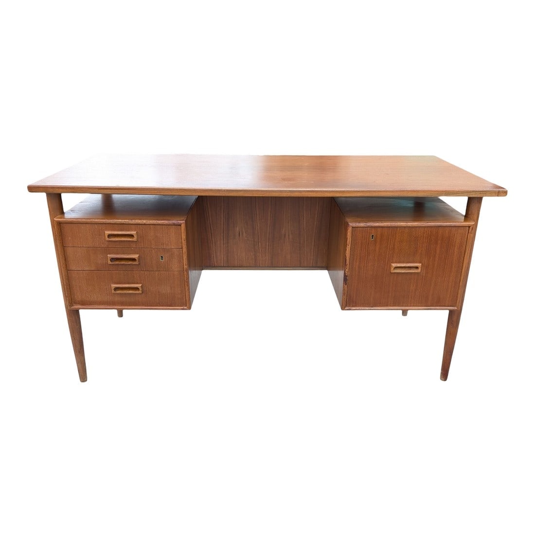 1960s Danish Mid Century Modern Floating Top Executive Desk: Wonderful desk in pecan. 57" x 27.25" x 29.25". Made in Denmark, possibly by Arne Vodder Condition: Alterations: Original Condition Unaltered Imperfections: Some Imperfections Condition Notes: Good pe