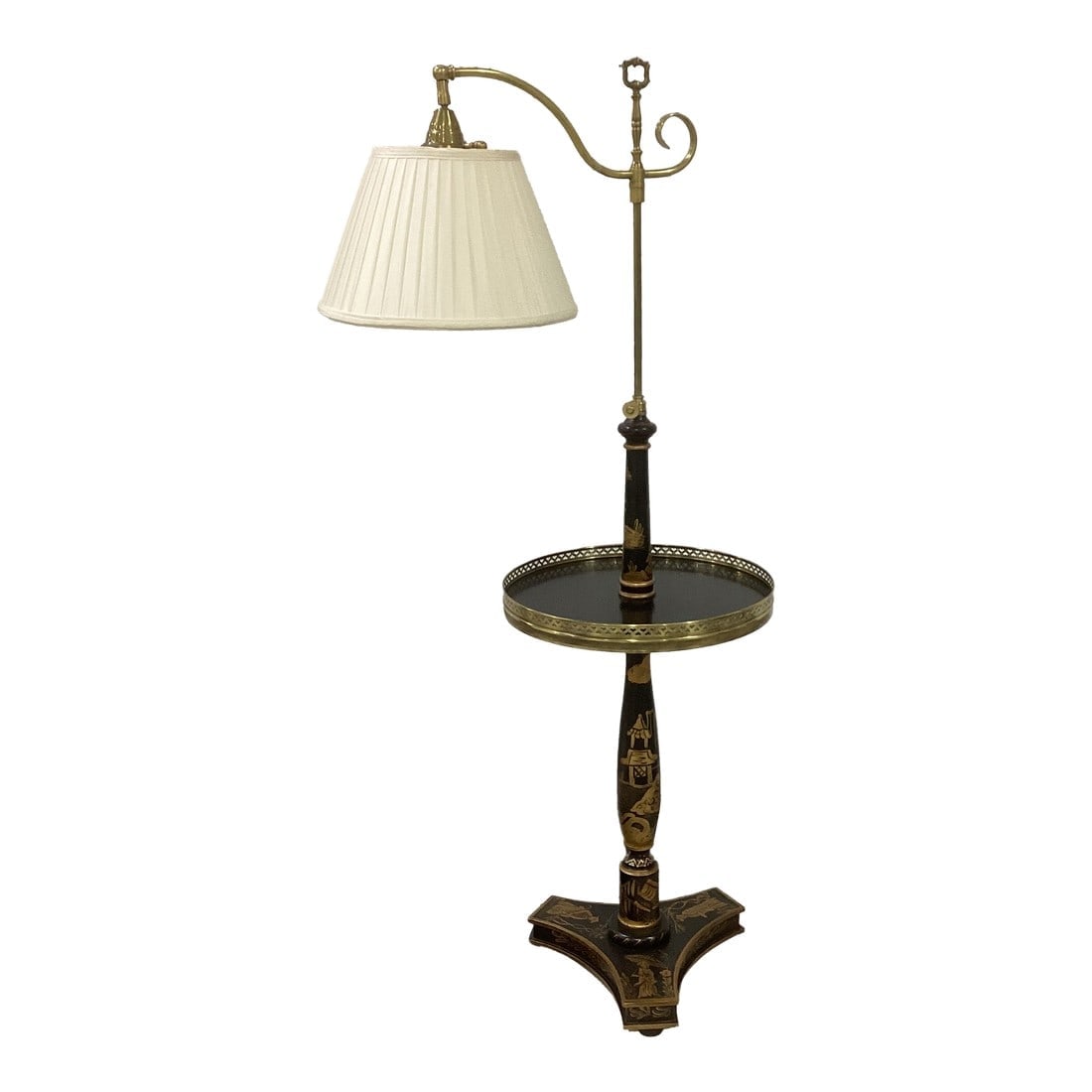 Late 20th Century Frederick Cooper Chinoisserie Floor Lamp With Integrated Table: Elegant and highly functional Frederick Cooper floor lamp featuring a classic Chinoiserie-inspired black lacquered column decorated with gilt scenic motifs. The lamp is thoughtfully designed with an i