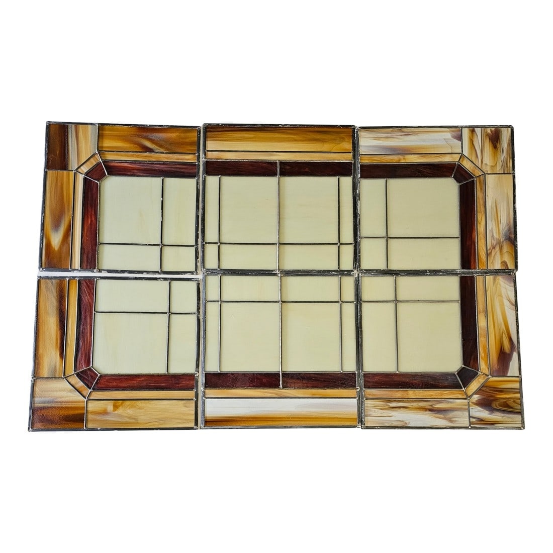 Vintage 1940s Slag Glass Panel – Geometric Mosaic Window, 6 Sections: This rare six-panel slag glass window, crafted in the 1940s, transcends its original purpose to stand as an architectural work of art. The geometric mosaic of amber, cream, and burgundy glass is frame