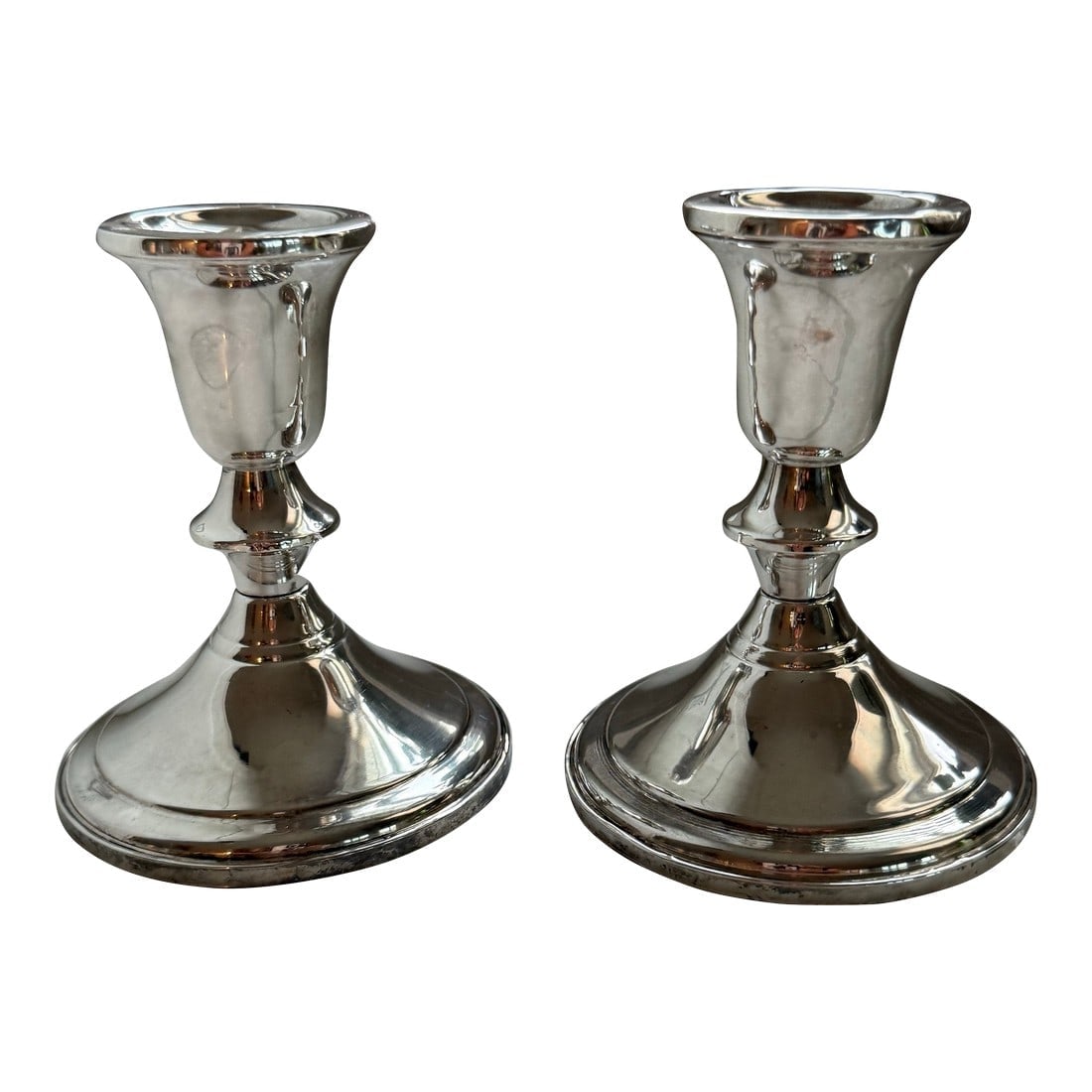 Sterling Silver Towle Candlesticks - A Pair: A pair of versatile sterling silver candlestick holders, by Towle Silversmiths, circa-20th century, USA. An elegant set for any dining table. Makers' mark, 'Towel', and marked 'Sterling', '925', on bo