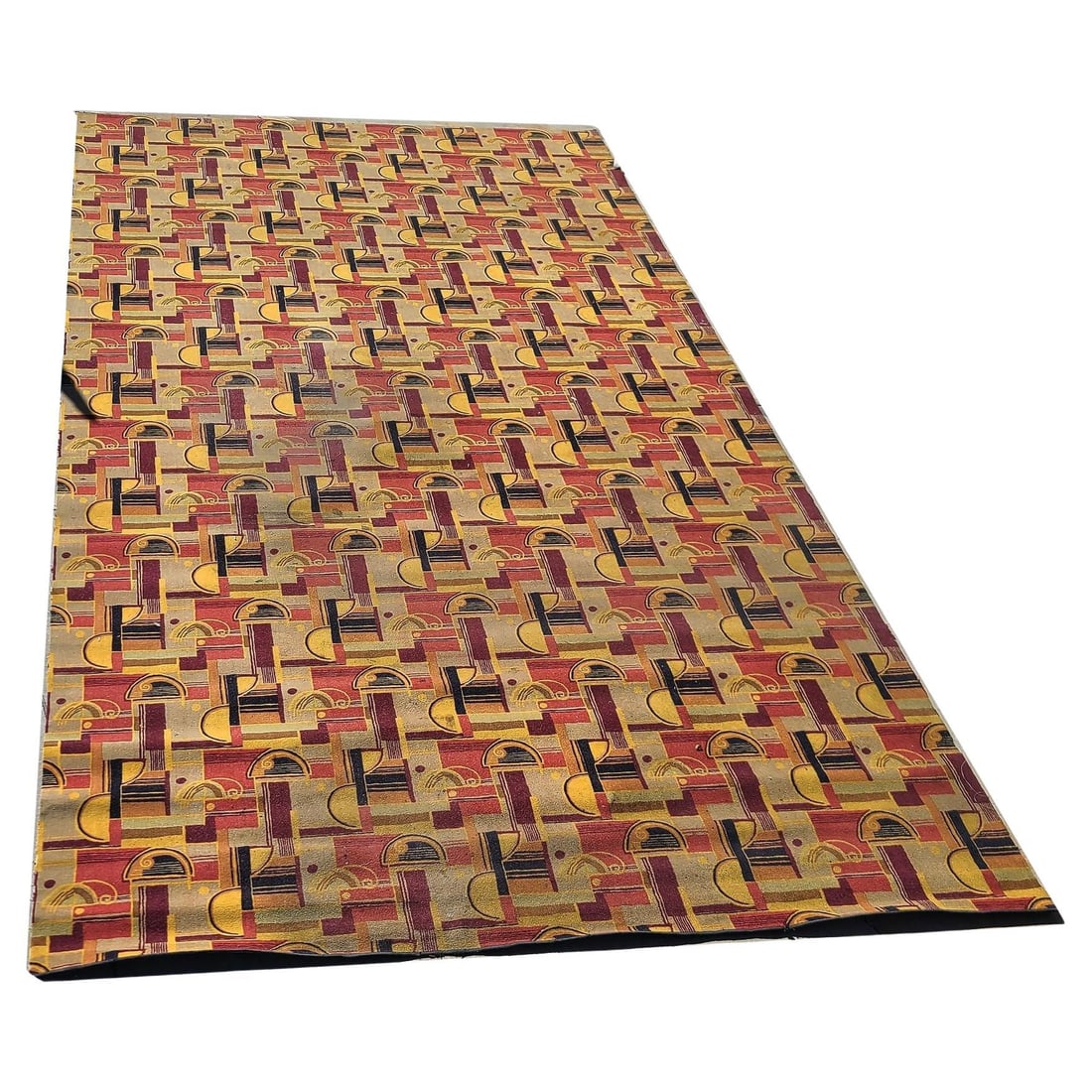 Large 22.7' Art Deco Edward Fields Style Area Rug from the Queen Mary: Title: Large 22.7' Art Deco Edward Fields Style Area Rug from the Queen Mary Description: Large Art Deco style Area rug featuring a multicolored geometric streamline pattern with warm reds, browns yel