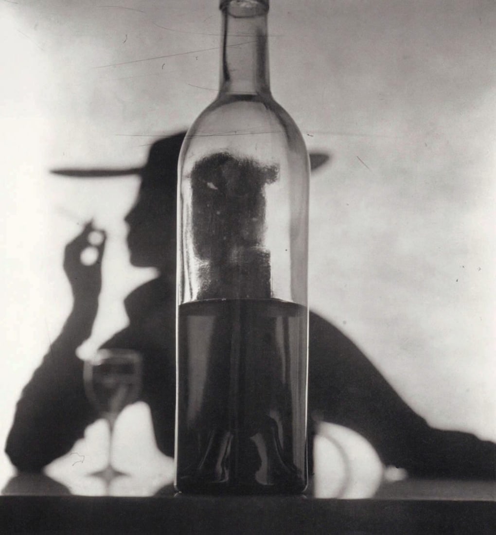 IRVING PENN - Girl Behind Bottle, NY, 1949: Title: IRVING PENN - Girl Behind Bottle, NY, 1949 Description: Artist: IRVING PENN Print Title: Girl Behind Bottle, NY, 1949, (Jean Patchett) Medium: Quad-tone Print Printed 1990’s in the US Image s