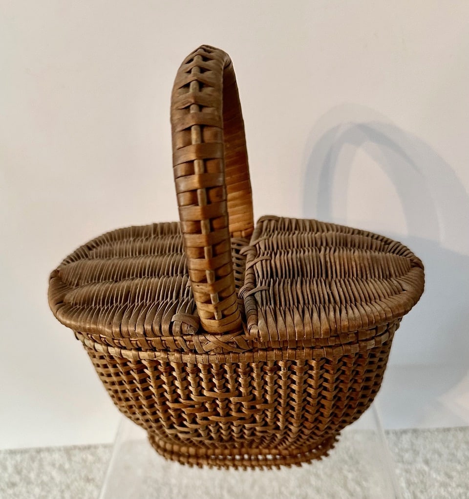 Miniature Double Lidded Sewing or Picnic Basket, c. 1900: A miniature double lidded sewing basket or picnic hamper, dating from the late 19th Century. The basket is 5 ¾” high at the top of the handle and about 4 1/8” wide at the top; the sid