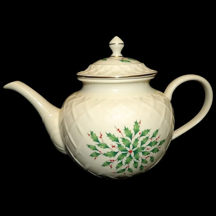 Lenox Dimensions Series Holly Berries with Gold Accents Teapot: This Lenox Dimensions Series Holly Berries with Gold Accents Teapot is one of the older classic Holiday Patterns for 1974. It is a 6 cup size. In excellent condition- NO chips, cracks, crazing or flea