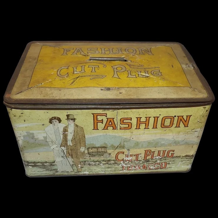 Antique Fashion Cut Plug Tobacco Tin: Antique cut plug tobacco tin that advertises, ‘Fashion Cut Plug Tobacco’. The lid is a bit sticky, but it does work, opens and closes tightly. Handle is for decoration only- lid it too tig