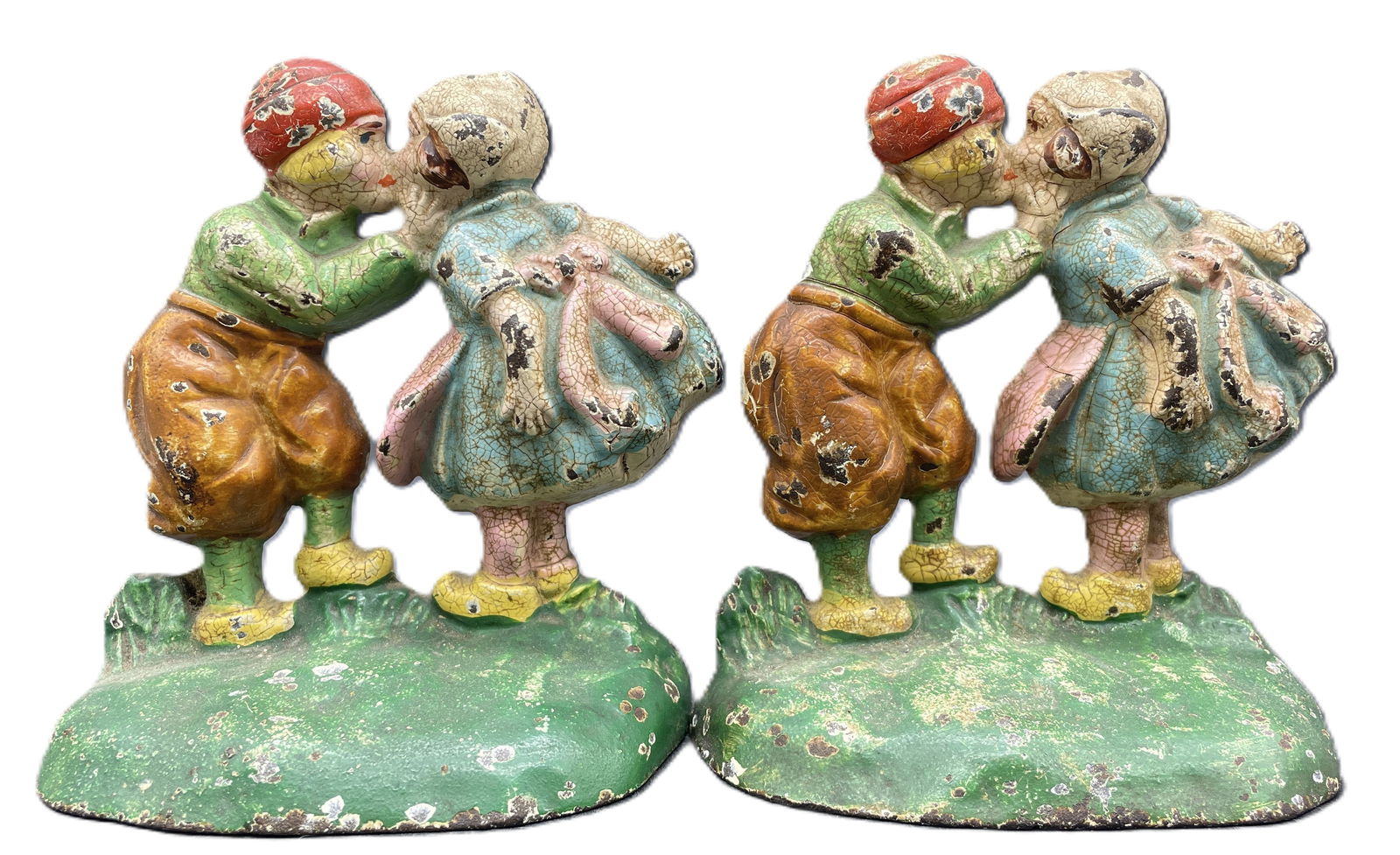 Antique HUBLEY #332 Kissing Dutch Kids Book Ends Doorstop Painted CAST IRON USA: Date/Period: Approx 1920-30's Dimension: Approx. 5" tall x 4.5" Material: cast iron Additional Information: This auction is for a charming pair of antique cast iron bookends made by the renowned Huble