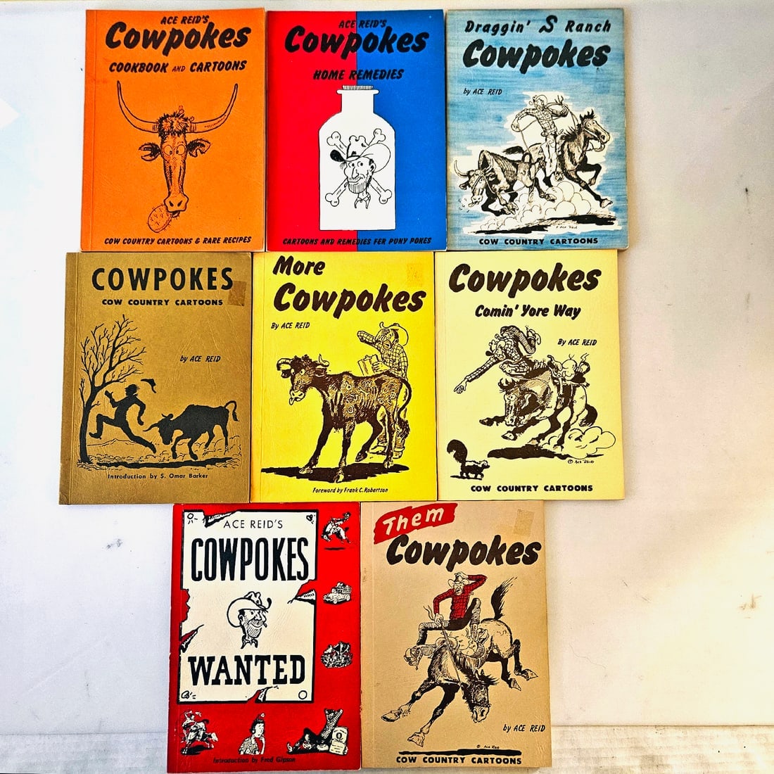 Set of 8 Cowpokes Books by Ace Reid paper backs One Signed: Title: Set of 8 Cowpokes Books by Ace Reid paper backs One Signed Description: Nationally known western artist and author Ace Reid of Kerville, Texas, writes about ranching, bankers, cows, horses, bei