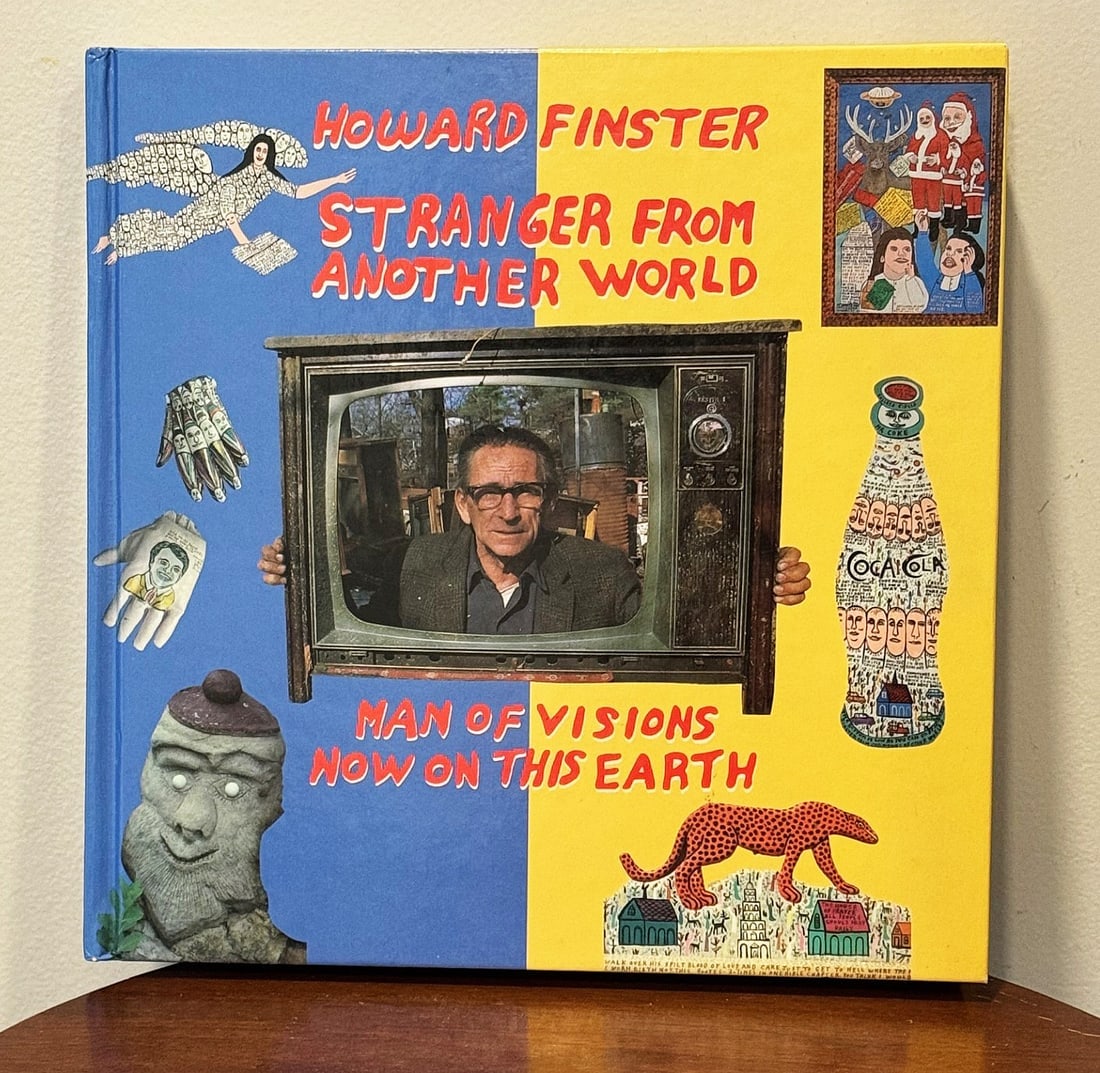 Howard Finster Stranger from Another World 1st Ed: Howard Finster, Stranger from Another World: Man of Visions Now on This Earth is a 1989 book by folk artist Howard Finster, co-authored with Tom Patterson, that serves as a visual and narrative a