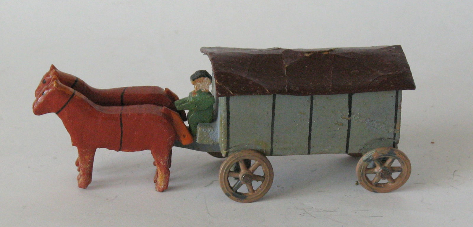 Antique German Putz horse & wagon toy: Title: Antique German Putz horse & wagon toy Date/Period: 1920's Dimension: 4” long Additional Information: Nice antique German Putz horse & wagon toy in great all original paint, patina & condi