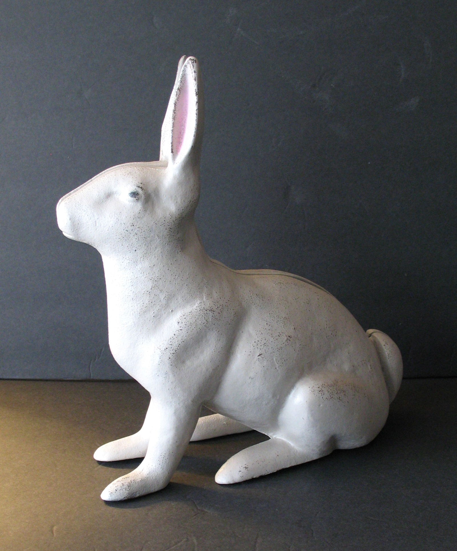 Antique cast iron rabbit door stop.: Title: Antique cast iron rabbit door stop. Date/Period: 1930's Dimension: 10” x 11” Additional Information: Nice antique cast iron rabbit door stop or garden figure in old paint, patina &