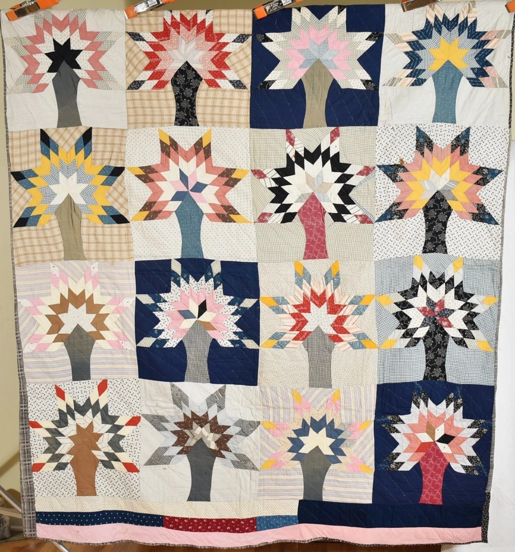 Tree of Life Quilt c. 1900: This GORGEOUS cotton 1900's tree of life quilt is all machine pieced and hand quilted, with an unusual design variation. A hand written note pinned to the back includes some provenance. It measures 66