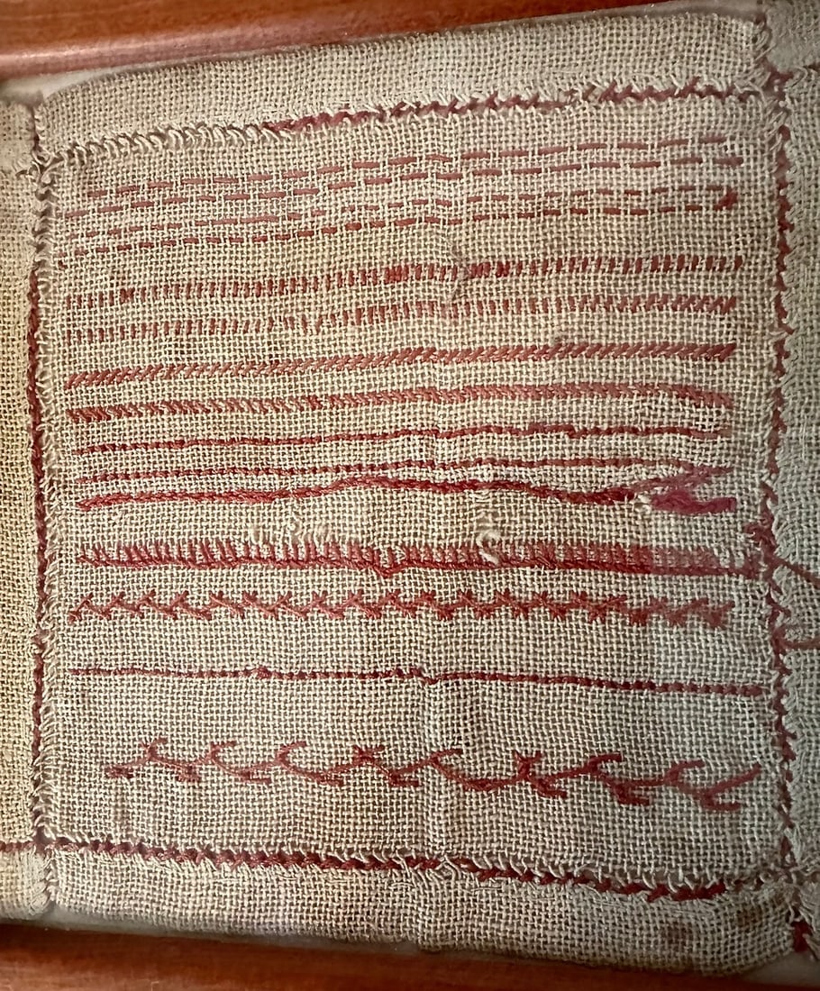 19th Century Needlework Practice Piece: A most unusual “Needlework Practice Piece” in which a young girl (most likely) learned how to make the various needlework stitches. There are 9 or 10 different kinds of stitches (I’m