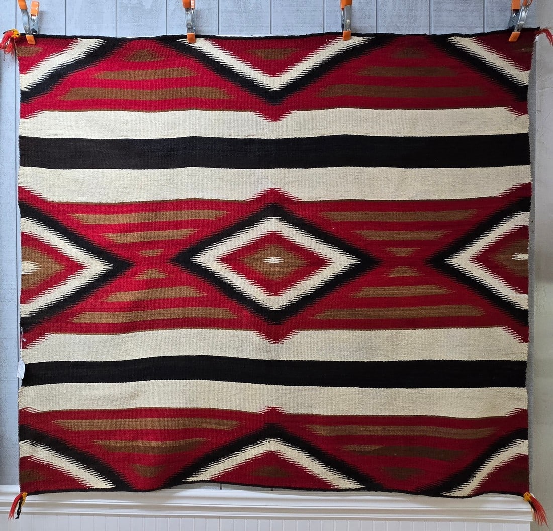 Navajo 3rd phase blanket: Title: Navajo 3rd phase blanket Dimension: 68.5" long x 75.5" wide Description: Navajo woven 3rd phase blanket/rug from the early 20th century. Probably around 1920. Medium fine weave with lazy lines.