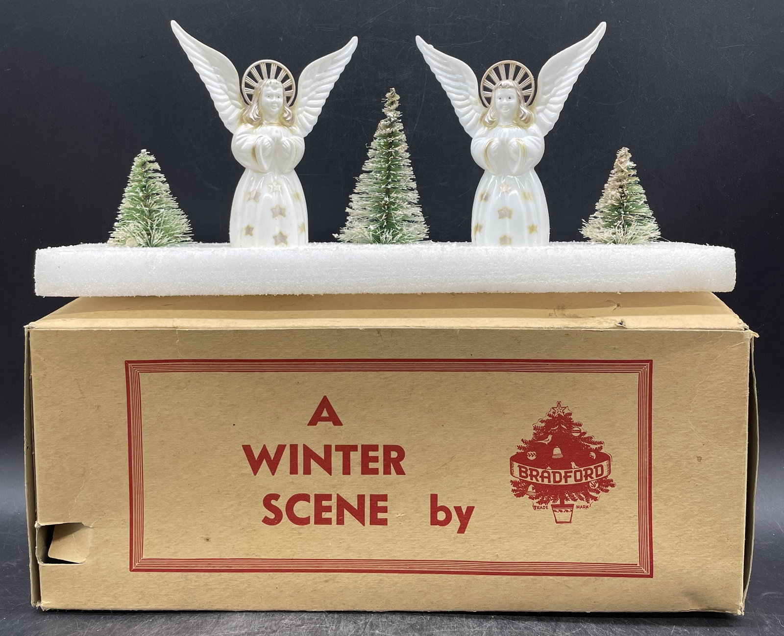 Bradford Winter Scene Christmas Decoration Hard Plastic Angels: Date/Period: unknown Dimension: 5" at tallest Material: plastic Additional Information: Bradford Winter Scene Christmas Decoration Hard Plastic Angels Shipping: Domestic: Flat-rate of $13.00 to anywhe