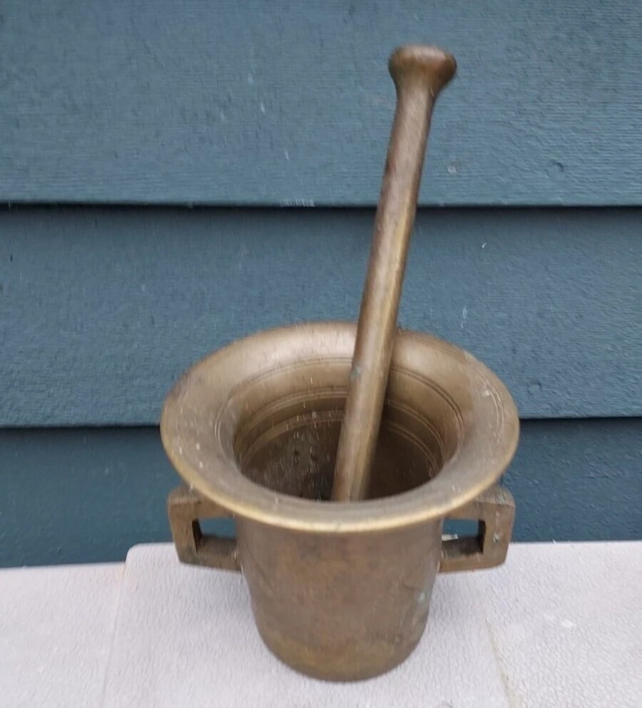 Antique Brass Mortar And Pestle 5lbs: I believe this dates to 18th century. Very heavy 5lbs. 4 1/2" tall. Shipping costs include insurance. Shipping: Domestic: Flat-rate of $20.00 to anywhere within the contiguous U.S. International: Fore
