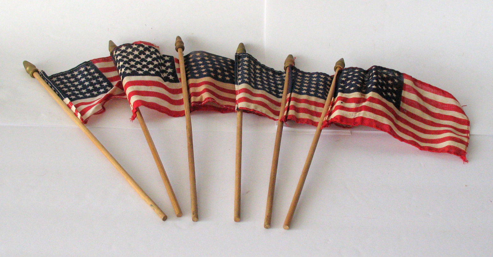 Group of six miniature parade flags. (1 of 3)