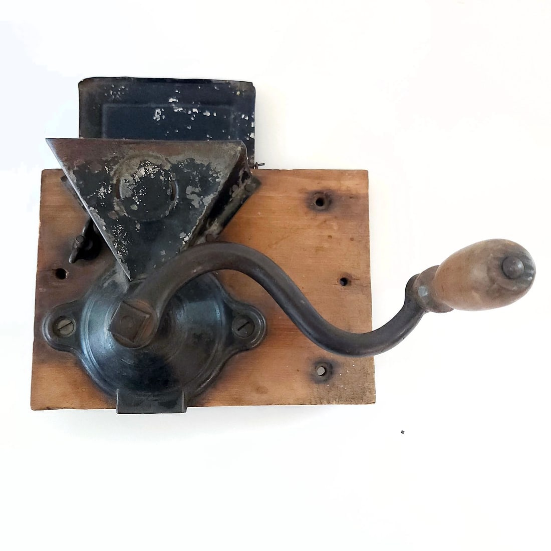 Antique Cast Iron Coffee Grinder: Title: Antique Cast Iron Coffee Grinder Description: 1800’s Cast Iron Flip Top Lid Wall Mount Coffee/Spice Grinder Cast Iron Body with Hand Crank Handle Turns Freely Metal Hopper with Lid Adjust