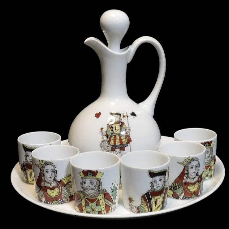 Vintage Porcelaine de Paris Neiman Marcus Limoges France 9 piece Liquor Decanter with King, Queen,: This 9 piece cordial set by Porcelaine de Paris Neiman Marcus Limoges France has Decanter with stopper and 6 cups, 2 of each with King, Queen and Jack on them. One of the Queen cups has a chip (shown
