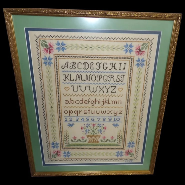 Vintage Handmade Cross Stitch Sampler Large Frame 1998: This Vintage Handmade Cross Stitch Sampler Large Frame 1998 is in excellent condition. Matted and framed professionally. Measures 24” x 19 ¼” x 1 ¼”. This vintage handmade