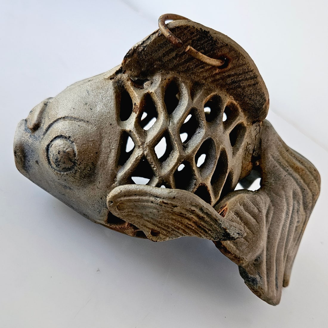 Cast Iron Fish Lantern Candle Holder Japanese Garden Décor: Title: Cast Iron Fish Lantern Candle Holder Japanese Garden Décor Description: This is a vintage cast iron koi fish candle holder or lantern circa late 20th Century It is designed to hold a tea l