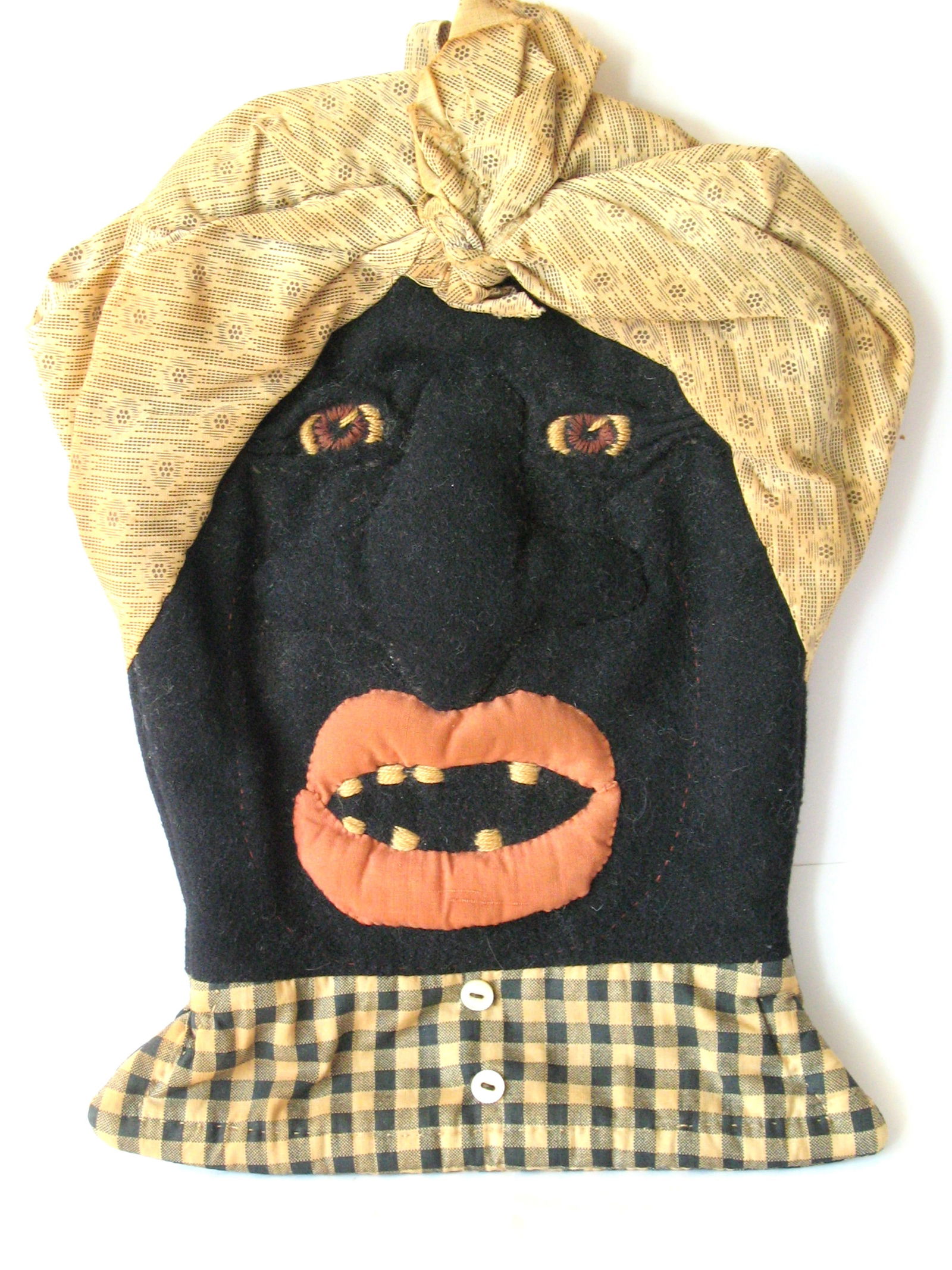 Antique folk art fabric Mammy hot pad.: Title: Antique folk art fabric Mammy hot pad. Date/Period: 1930's Dimension: 12” x 8 1/2” Additional Information: Nice antique folk art Mammy hot pad in great all original patina & conditi