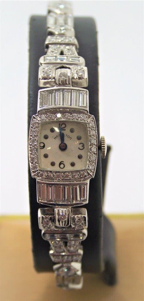 Vintage HAMILTON 1950's Platinum Ladies Watch with 6 cts Diamonds VS1 E/F Color: Vintage HAMILTON 1950's Platinum Ladies Watch with 6 cts Diamonds VS1 E/F Color Great present for vintage watch collectors & enthusiasts! * Hamilton Series Ladies watch Collection with Diamonds * Case