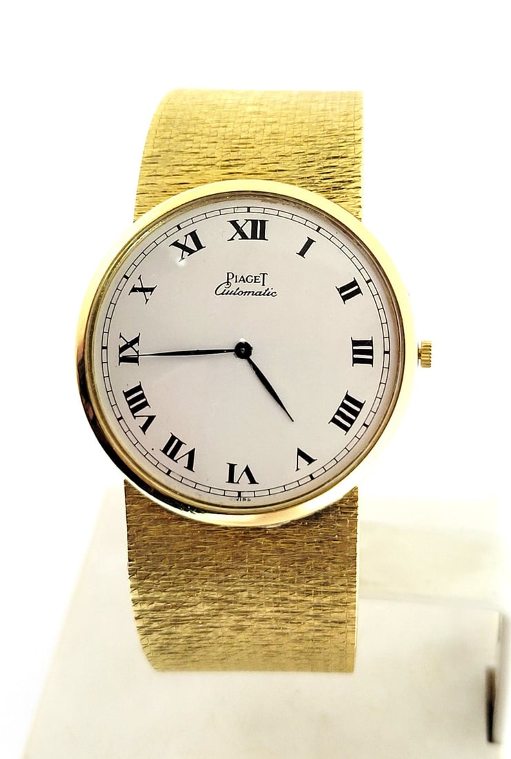 Mens Solid 18k Yellow Gold PIAGET Automatic Watch Ref 12212 Cal 12PI* EXLNT: Mens Solid 18k Yellow Gold PIAGET Automatic Watch Ref 12212 Cal 12PI* EXLNT ​ ​ This Mens PAIGET watch is Swiss made. Great present for yourself or someone you love as well as for collecto