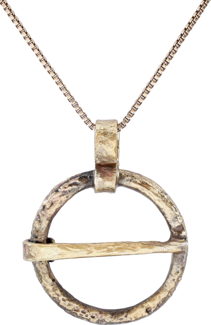 VIKING PROTECTIVE ARMOR BROOCH NECKLACE, 10th-11th CENTURY AD.: Worn in numbers on the surface of the jerkin, these small metal brooches provided a measure of protection against sword cuts and, in fact, were a form of armor. See current Public Television programmi