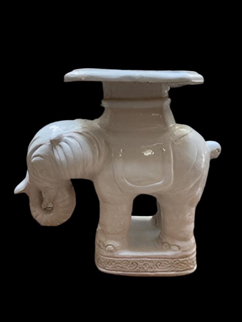 Vintage White Elephant Pedestal Stand Table: Vintage White Elephant Pedestal Accent Table This elephant statue can be used as a plant stand or indoor/outdoor table. Freshen up your patio space by adding this ceramic garden stool. Position it by