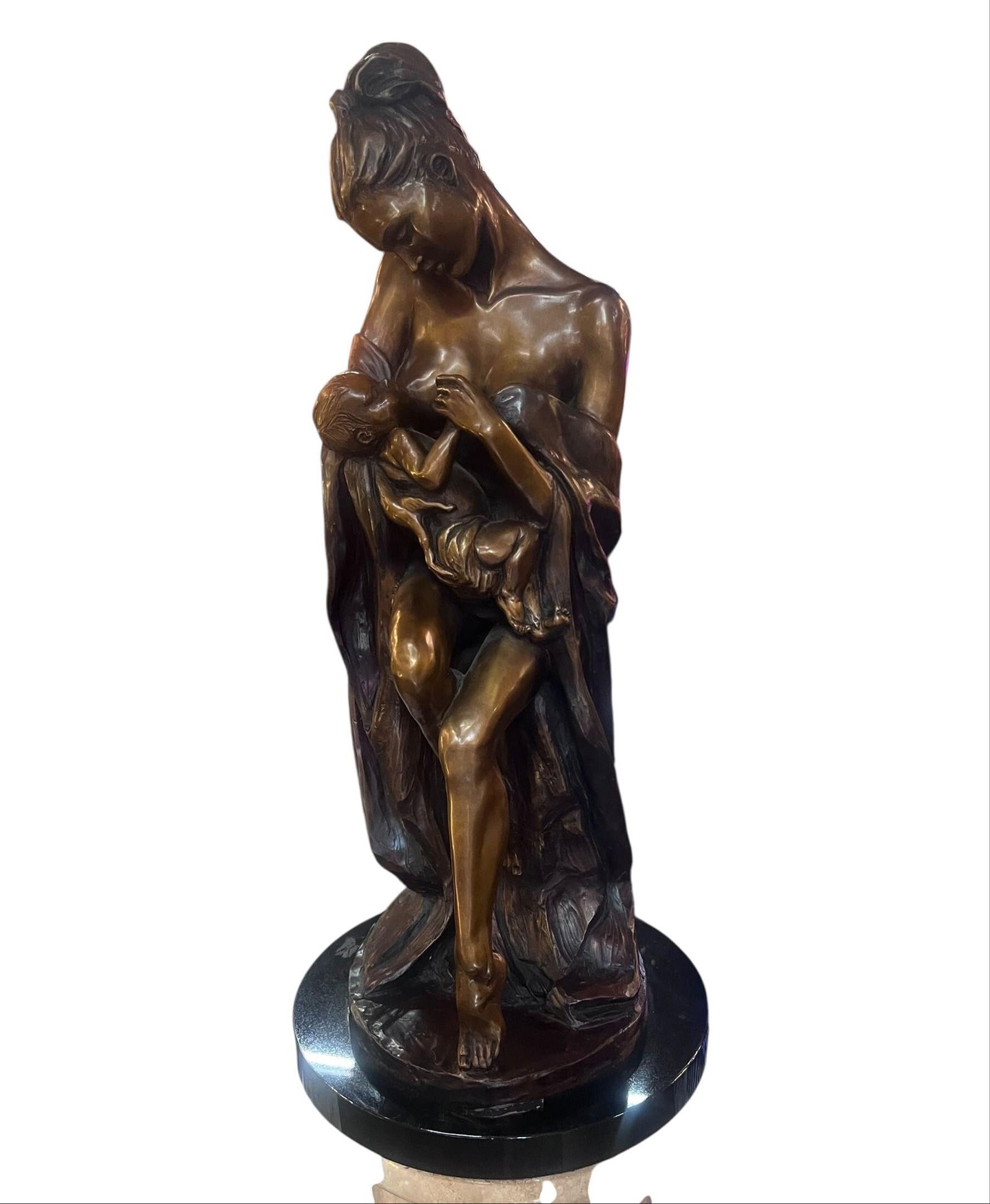 Vintage Mother and Child Bronze SculptureBy Rebecca Ghiglieri: Vintage Mother and Child Heavy Bronze Sculpture By Rebecca Ghiglieri on Marble Base This stunning piece, elegantly mounted on a solid marble base, captures the tender bond between mother and child, ma