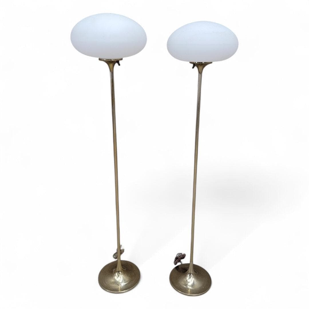 Mid Century Modern Laurel Brass Tulip Base with Milk-Glass Shade Mushroom Floor Lamps - Pair: Mid Century Modern Laurel Brass Tulip Base with Milk Glass Shade Mushroom Floor Lamps - Pair Elevate your interior decor with this pair of Mid Century Modern floor lamps, featuring Laurel brass tulip