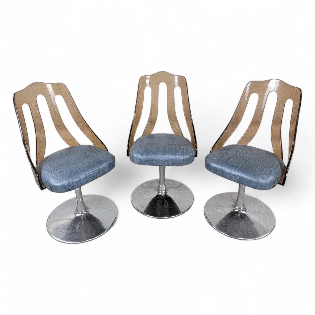 Mid Century Modern Lucite Swivel Chairs – Embossed Leather, Set of 3: Mid Century Modern Retro Space Age Chrome Tulip Tinted Lucite Curved Back Swivel Dining/Side Chairs New Reupholstered in Retro Embossed Patterned Leather - Set of 3 This set of three Mid Century Moder