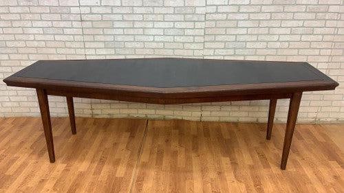 Mid Century Danish Narrow Boat Shaped Console Table with Black Laminate Inlay: Mid Century Danish Walnut Narrow Boat Shaped Console Table with Black Laminate Inlay This rare Florence Knoll style Danish walnut boat-shaped console table will bring any mid-century room to life. The