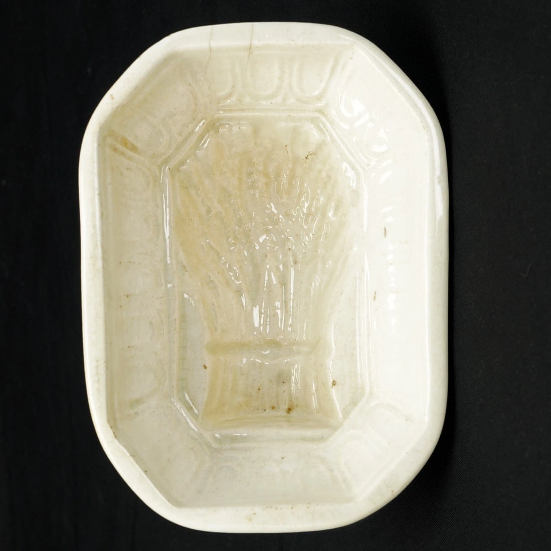Miniature 19th C Food Mold Wheat Sheaf: Title:Miniature 19th C Food Mold Wheat Sheaf Size:4 ¼ in (10.8 cm) long x 3 1/8 in (7.9 cm) wide x 1 5/8 in (4.1 cm) tall. Description:A small Victorian food or butter mold with a detailed desi