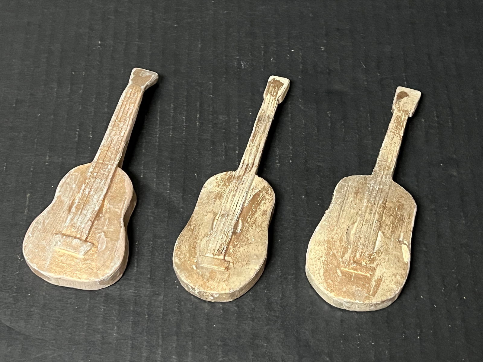 Late 20th Century Carved Wood Miniature Instrument Set of 3: Title: Late 20th Century Carved Wood Miniature Instrument Set of 3 Date/Period: Late 20th Century Description: Carved Wood Miniature Instrument Set of 3 Materials: Wood Size: 5.5" h x 2" w Reserve: $4