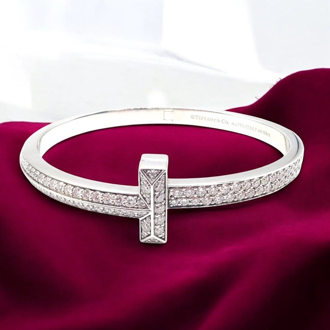 Authentic! Tiffany & Co 18k White Gold Diamond T1 Wide Hinged Bangle Bracelet: Authentic! Tiffany & Co 18k White Gold Diamond T1 Wide Hinged Bangle Bracelet About This Piece: This stunning Tiffany & Co. T1 hinged bangle bracelet is crafted in luxurious 18k white gold and adorned