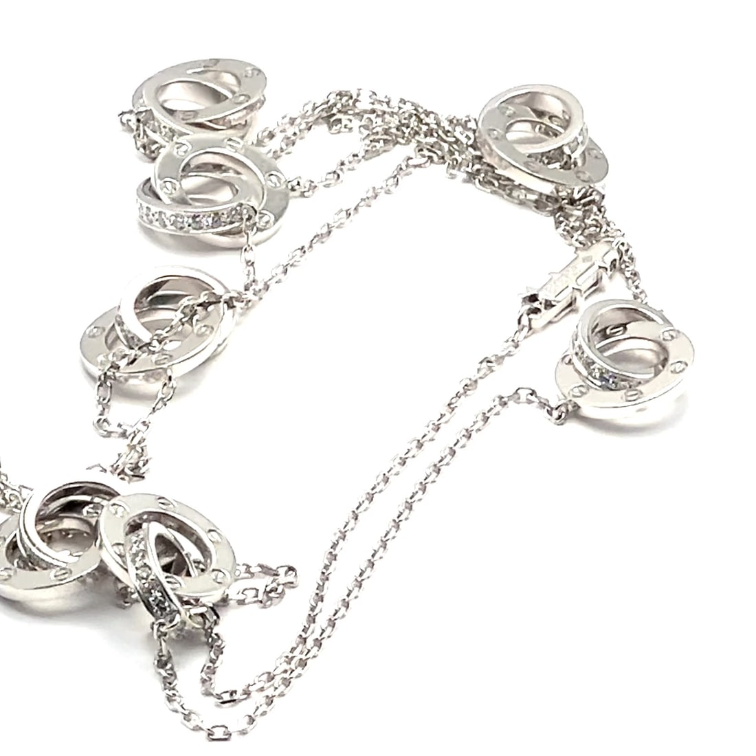 Rare! Authentic Cartier 18k White Gold Diamond Love 8 Station 36" Long Necklace: Rare! Authentic Cartier 18k White Gold Diamond Love 8 Station 36" Long Necklace About This Piece: Metal: 18k white gold Length: 36" Weight: Station Width: 32 grams 13mm Stones: 144x round brilliant cu