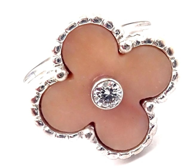 Authentic! Van Cleef & Arpels Alhambra 18k White Gold Pink Opal Diamond Ring: Authentic! Van Cleef & Arpels Alhambra 18k White Gold Pink Opal Diamond Ring About This Piece: Metal: 18k white gold Size: Width: European 48, US 4.5 15mm Weight: 6.6 grams Stones: 1 alhambra shape pi