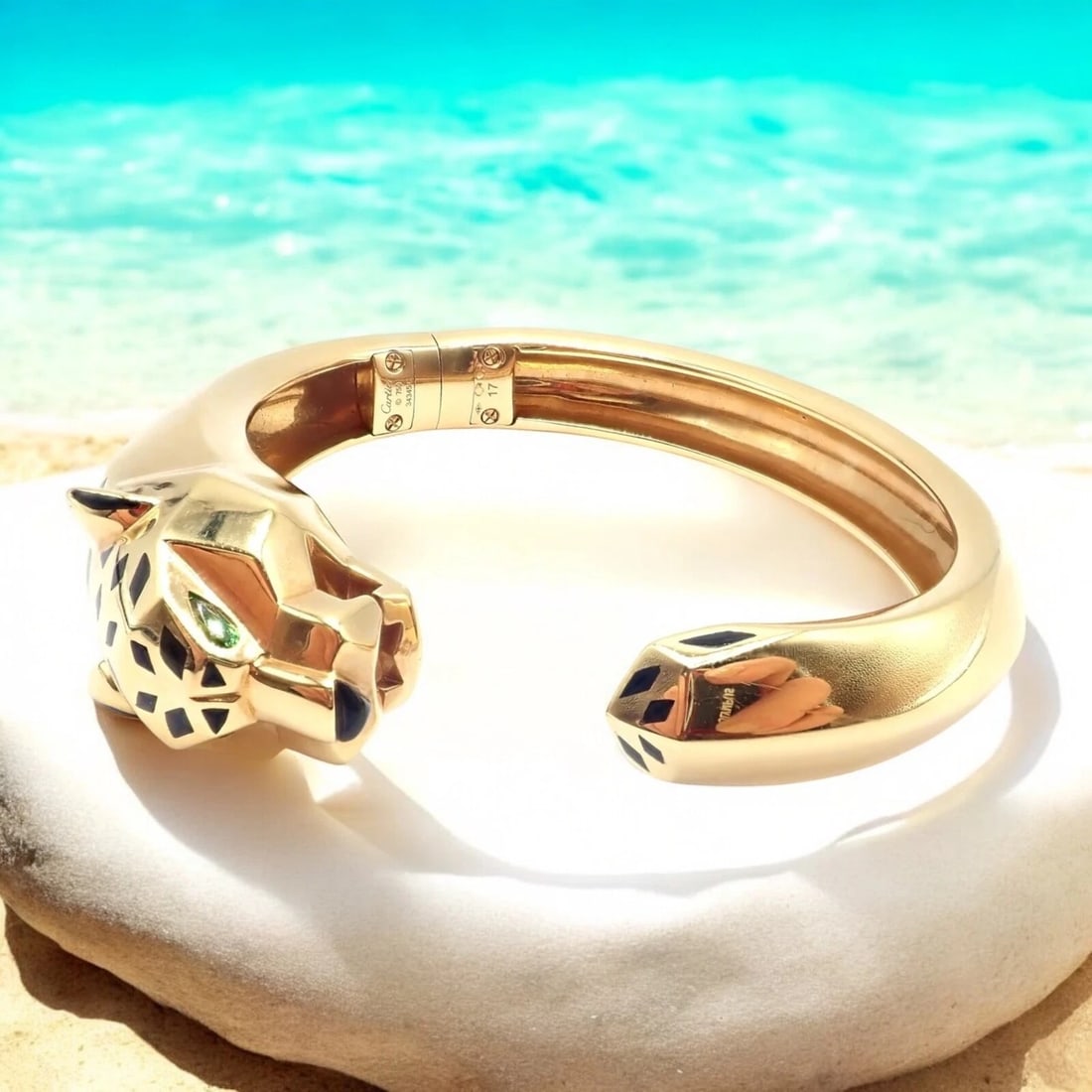 Authentic! Cartier Panther Panthere 18k Yellow Gold Cuff Bracelet Size 17 Cert: Authentic! Cartier Panther Panthere 18k Yellow Gold Cuff Bracelet Size 17 Cert About This Piece: The Cartier Panther Panthere bangle is a luxurious piece, crafted in 18k yellow gold. This size 17 brac