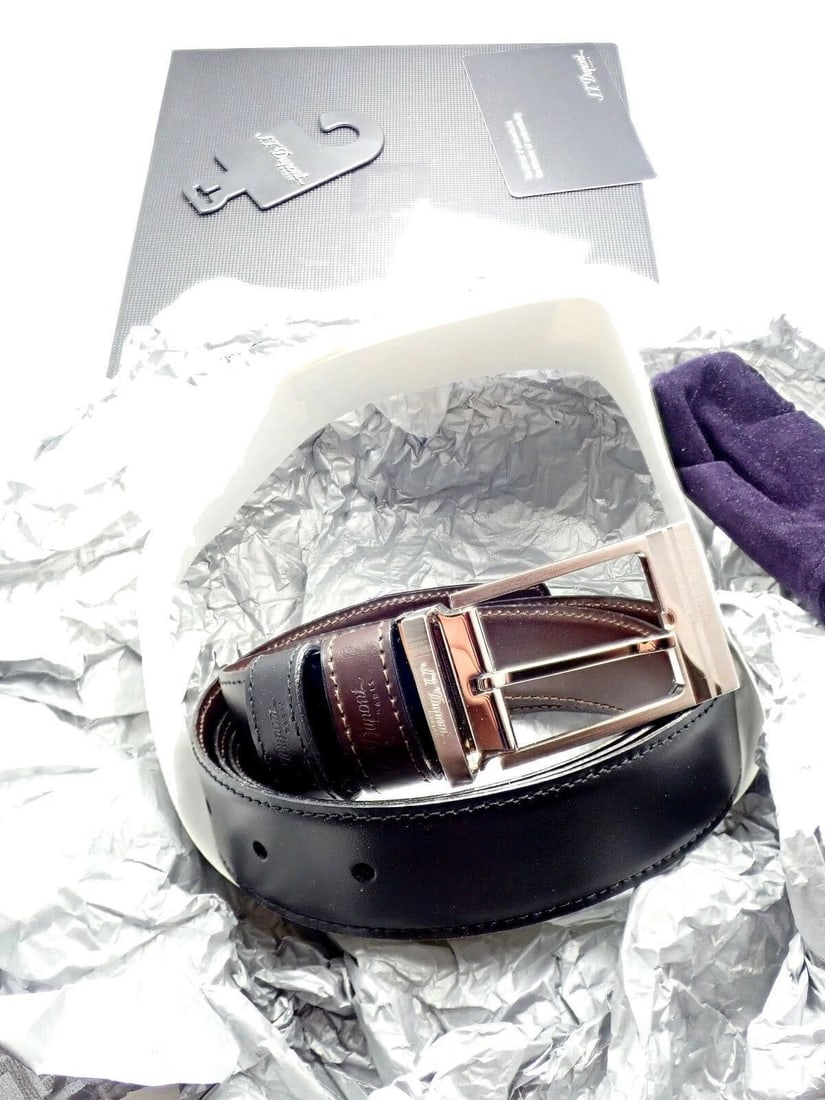 Authentic S. T. Dupont Black Leather Palladium Belt w/ Box + Card 47": Authentic S. T. Dupont Black Leather Palladium Belt w/ Box + Card 47" About This Piece: Metal: Palladium belt buckle, leather belt Includes: Box, Tissue, Cards, Tags Marked: S.T.Dupont Paris Made In I
