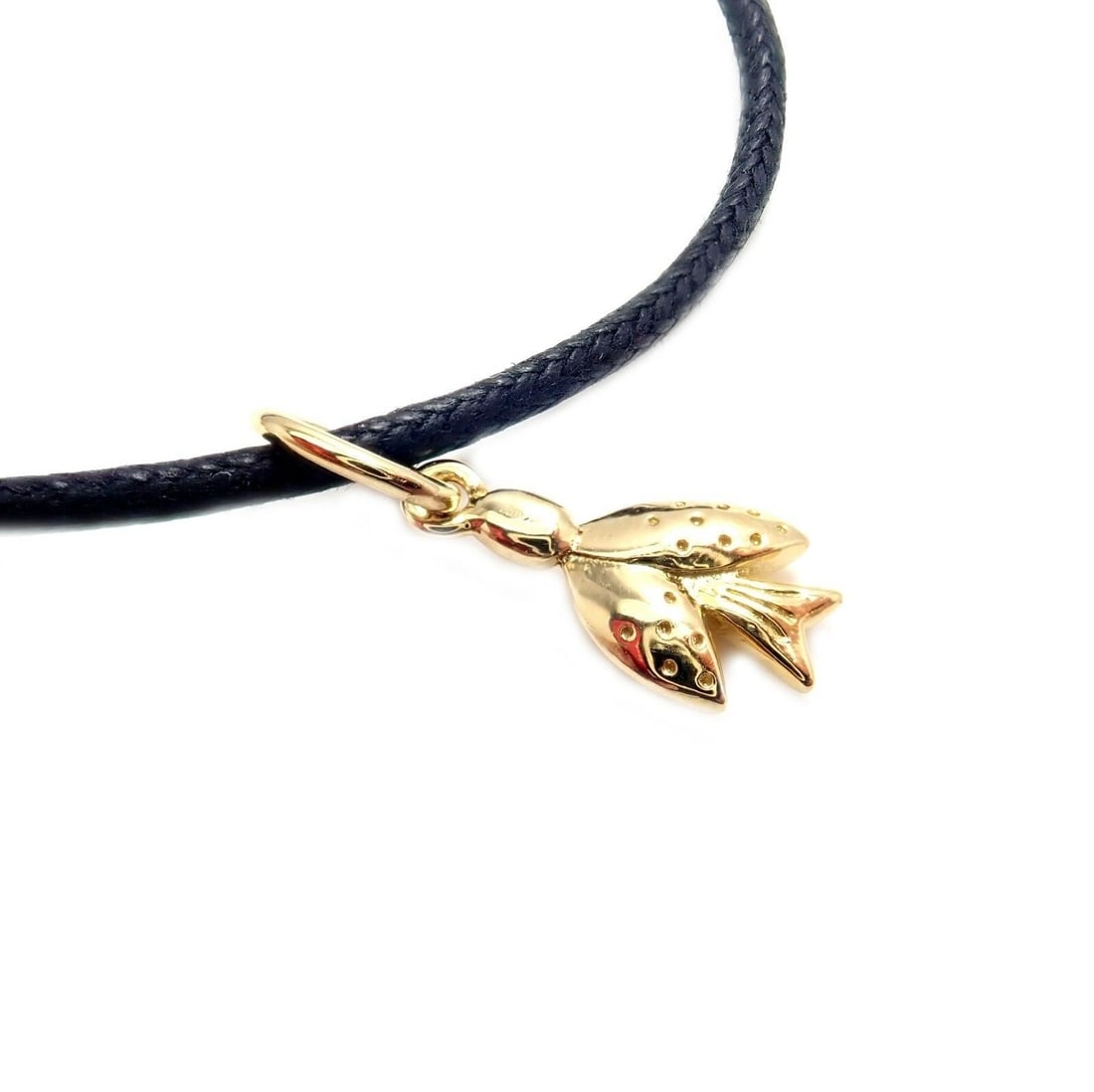 Temple St Clair 18k Flying Dove Charm Cord Bracelet: Temple St Clair 18k Flying Dove Charm Cord Bracelet Reserve: $300.00 Shipping: Domestic: Flat-rate of $35.00 to anywhere within the contiguous U.S. International: Foreign shipping rates are determined