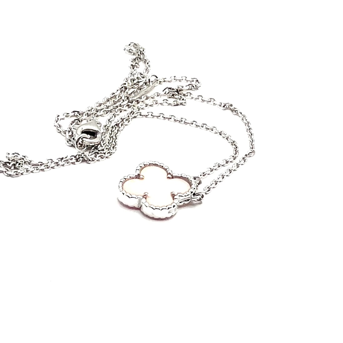 Authentic! Van Cleef & Arpels Alhambra 18k White Gold Pink Opal Pendant Necklace: Authentic! Van Cleef & Arpels Alhambra 18k White Gold Pink Opal Pendant Necklace About This Piece: The Van Cleef & Arpels Alhambra 18k White Gold Pink Opal Pendant Necklace is a stunning piece of jewe