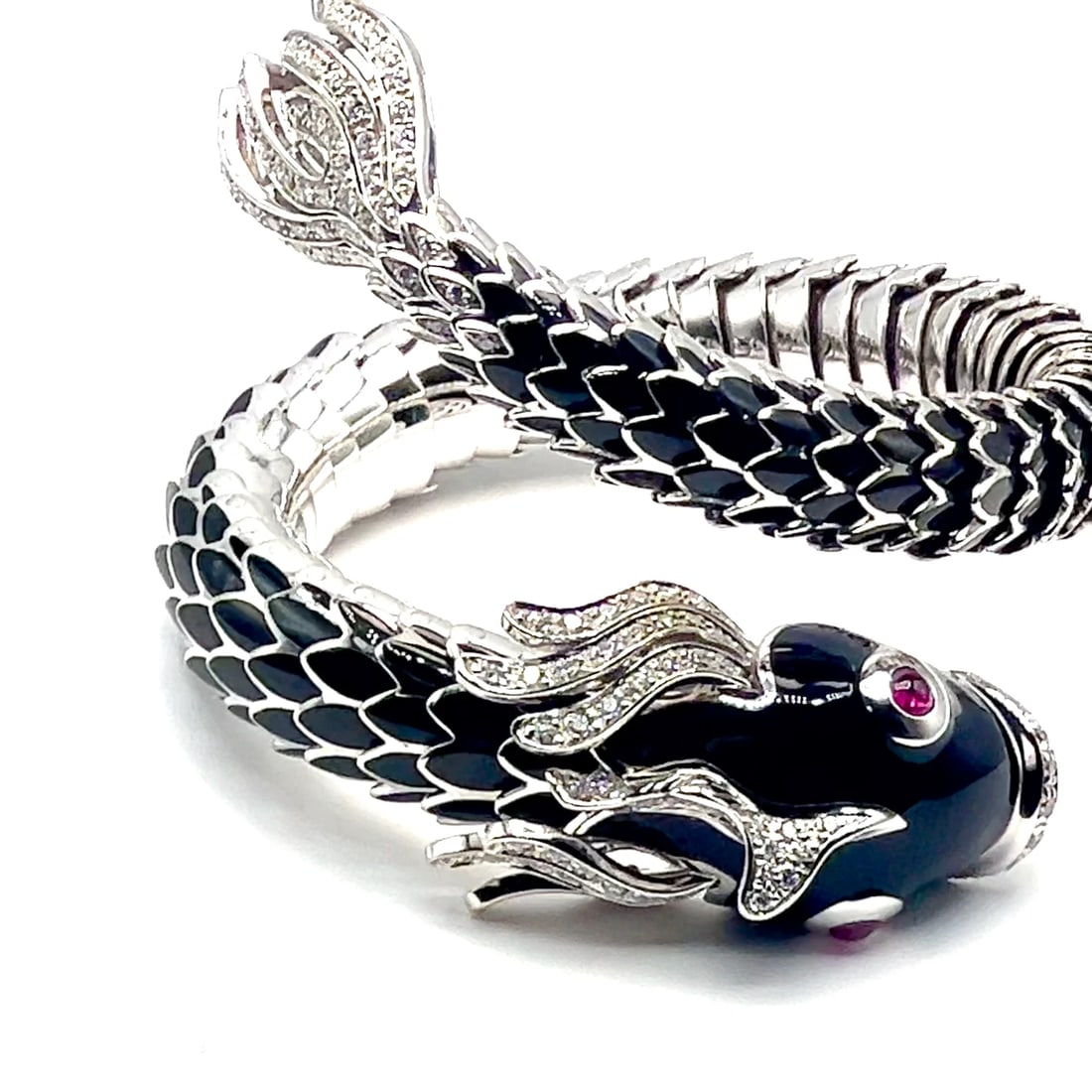 Authentic! Roberto Coin Nemo 18k White Gold Diamond Ruby Enamel Cuff Bracelet: Authentic! Roberto Coin Nemo 18k White Gold Diamond Ruby Enamel Cuff Bracelet About This Piece: This is a absolutely gorgeous Limited Edition bracelet number 3 out of 25 ever made by Roberto Coin. Met