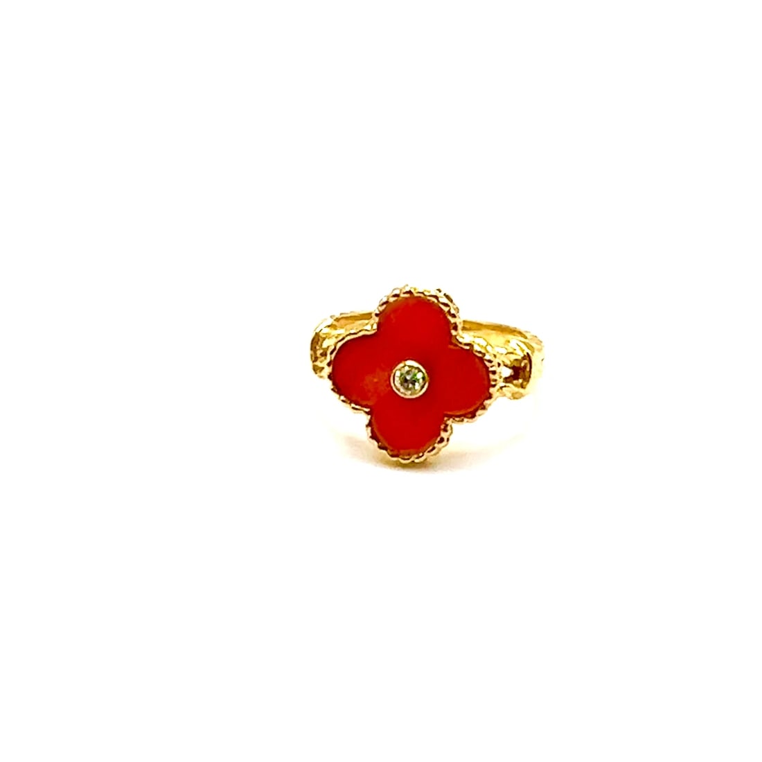 Rare! Authentic Van Cleef & Arpels Alhambra 18k Yellow Gold Coral Diamond Ring: Rare! Authentic Van Cleef & Arpels Alhambra 18k Yellow Gold Coral Diamond Ring About This Piece: Metal: 18k yellow gold Size: Width: 4 3/4 (Resize Available) 14mm Weight: 4.9 grams Stones: 1 alhambra