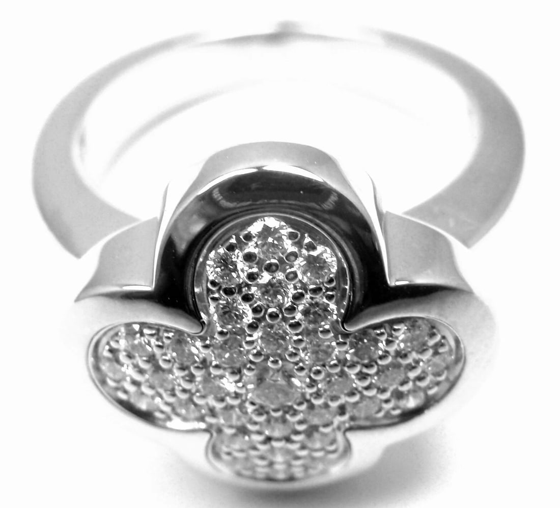 Authentic! VAN CLEEF & ARPELS VCA 18k White Gold Diamond Pure Alhambra Ring: Authentic! VAN CLEEF & ARPELS VCA 18k White Gold Diamond Pure Alhambra Ring About This Piece: Metal: 18k white gold Measurements: Size: European 50 US 5.25 Width: 16mm Weight 12.6 grams Stones: 33 rou